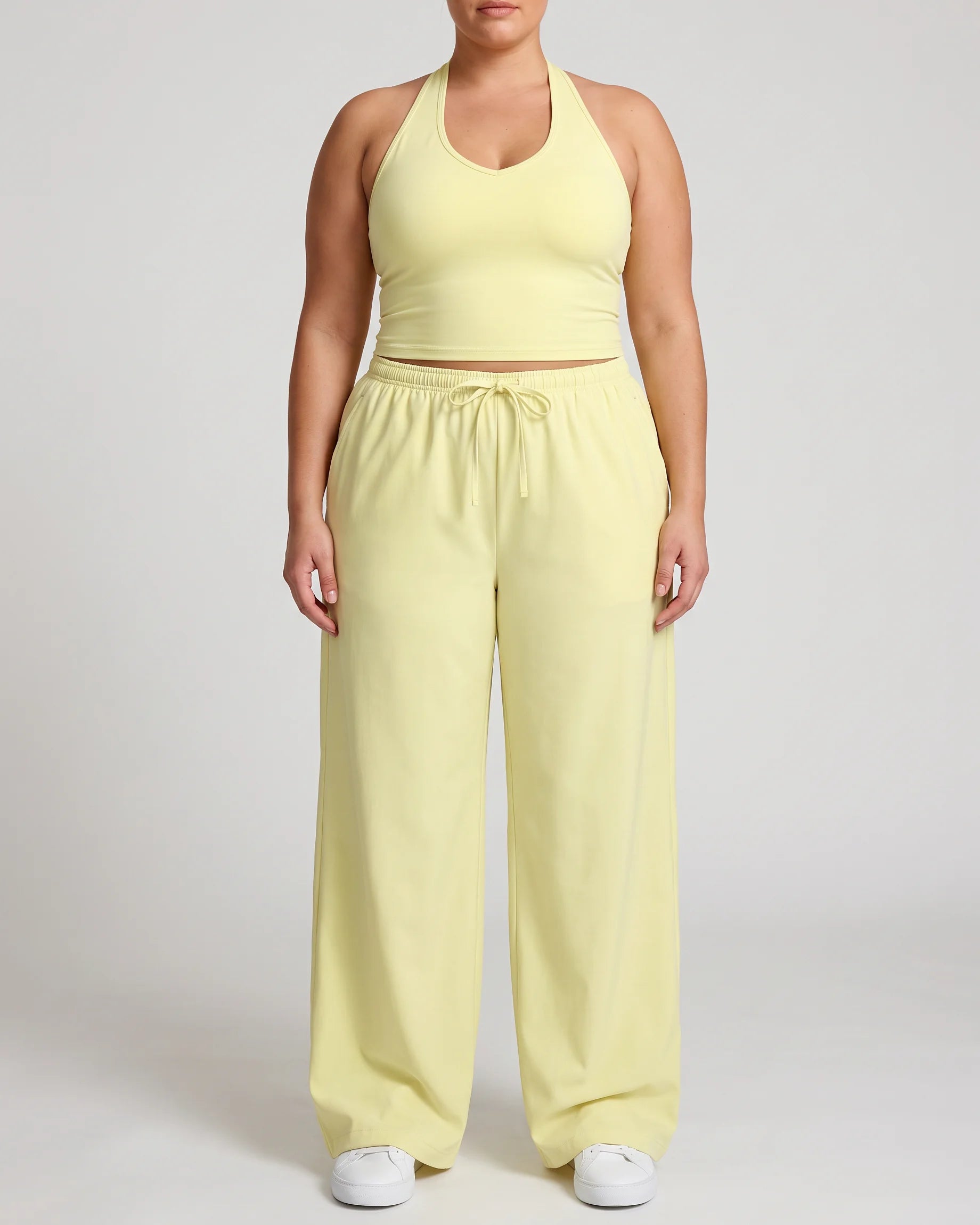 Curvana nvwa womens two piece summer casual v neck top wide leg pants womens holiday tra plus size pastel yellow front view