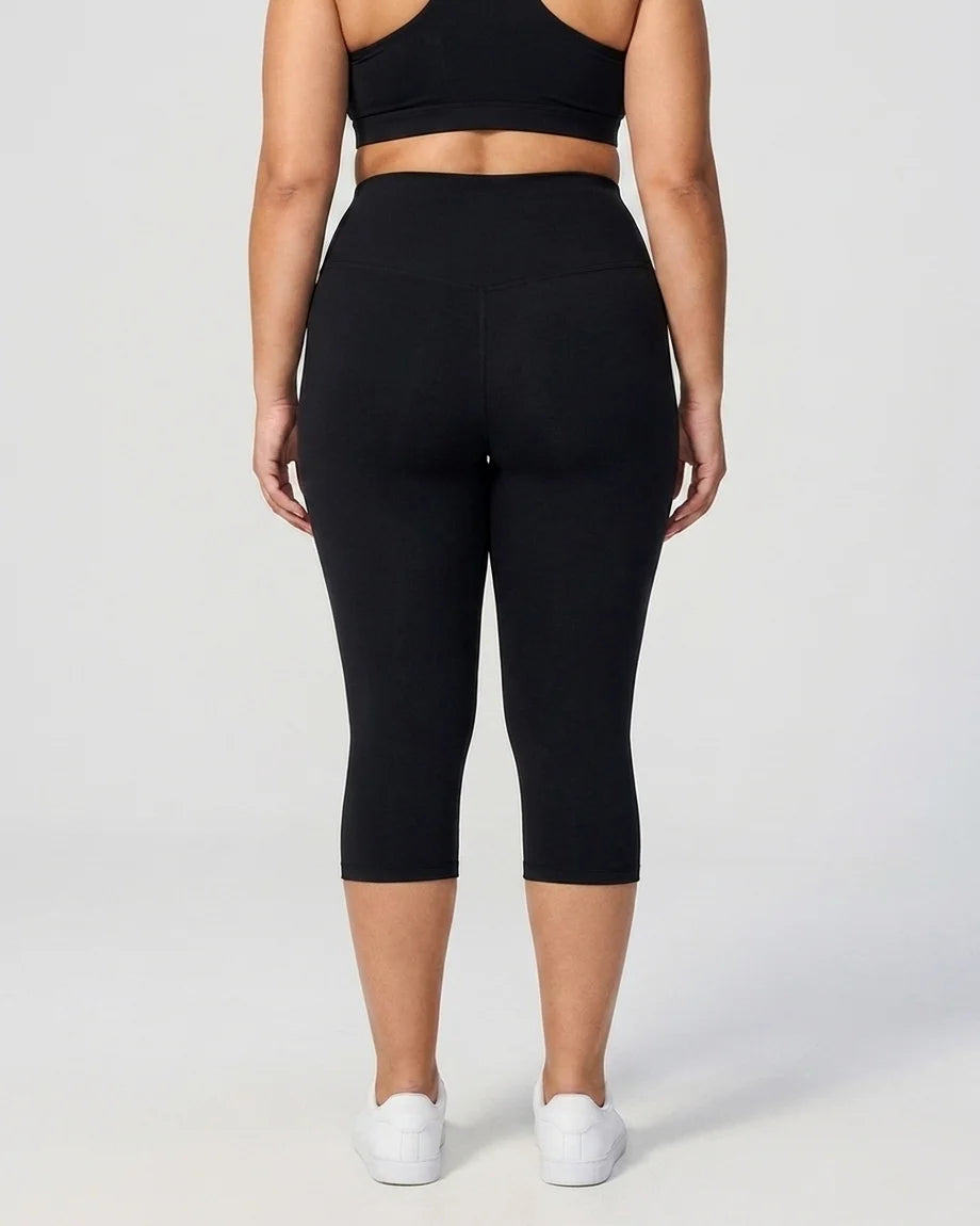 Curvana tummy control capri legging plus size black back view